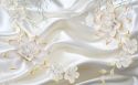 Balta nefrito gėlė audinio fone